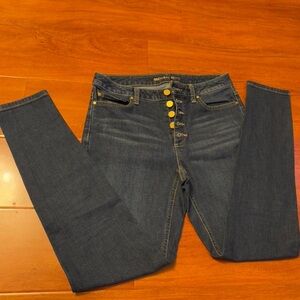 Michael Kors women's dark wash skinny jeans with gold buttons